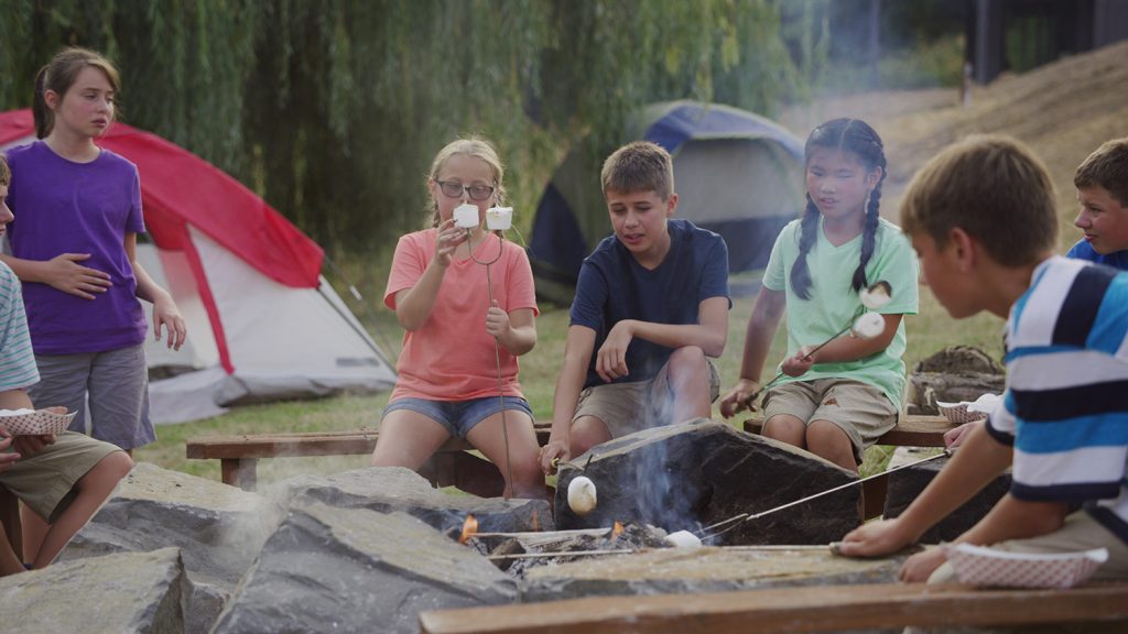 Kids around fire
